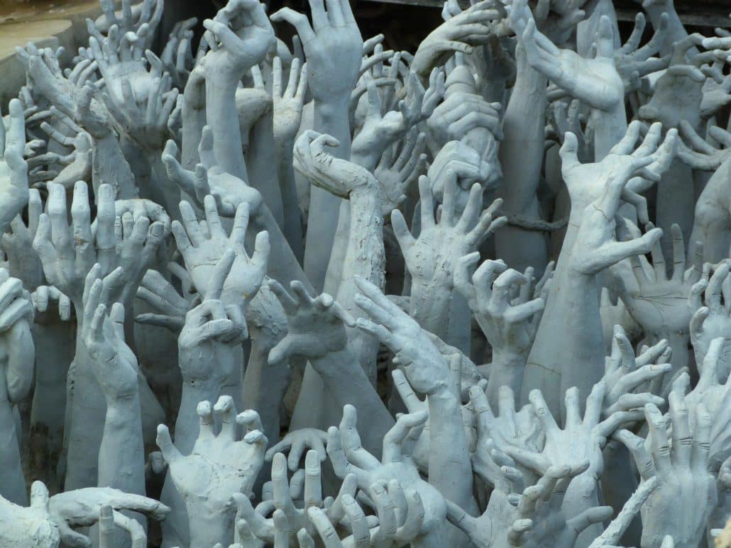 Wat Rong Khun White Temple Thailand Hands