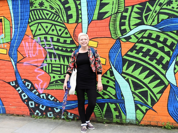 Alice Teacake in front of Shoreditch London Street Art