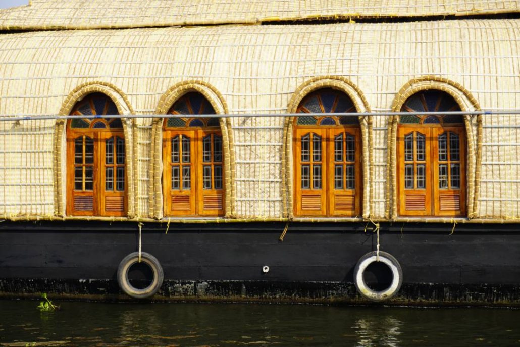 Side view of a houseboat with doors