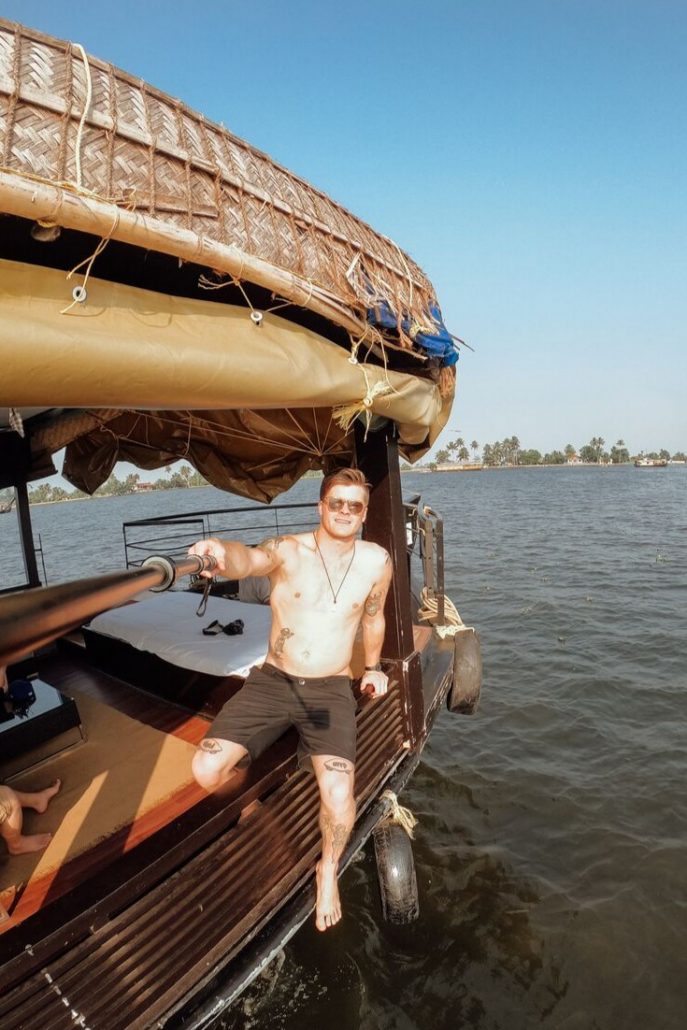 Jonny Melon takes a selfie on a houseboat in river