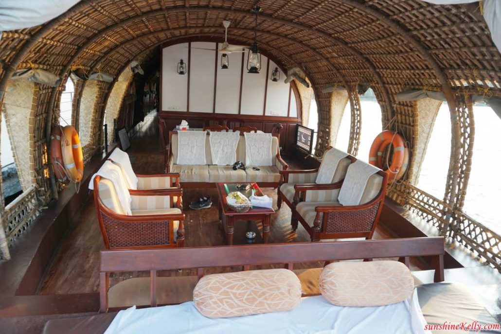 The inside of Lakes and Lagoons luxury houseboat in Kerala India