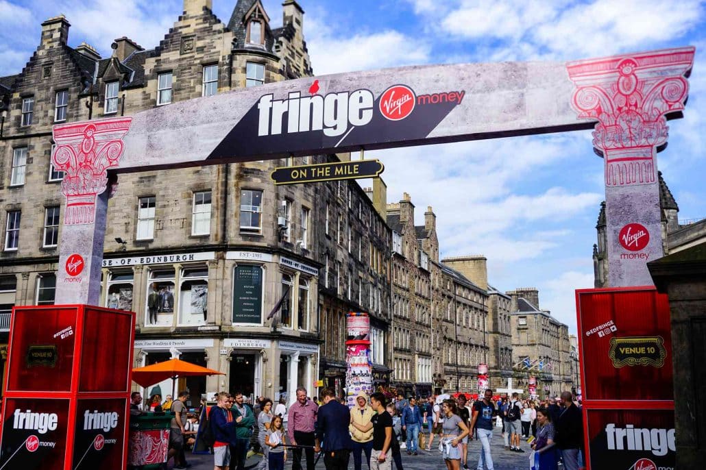 Tourists at the Virgin Money Street Event on the Royal Mile in Edinburgh Festival in Scotland