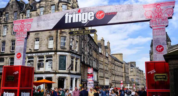Tourists at the Virgin Money Street Event on the Royal Mile in Edinburgh Festival in Scotland