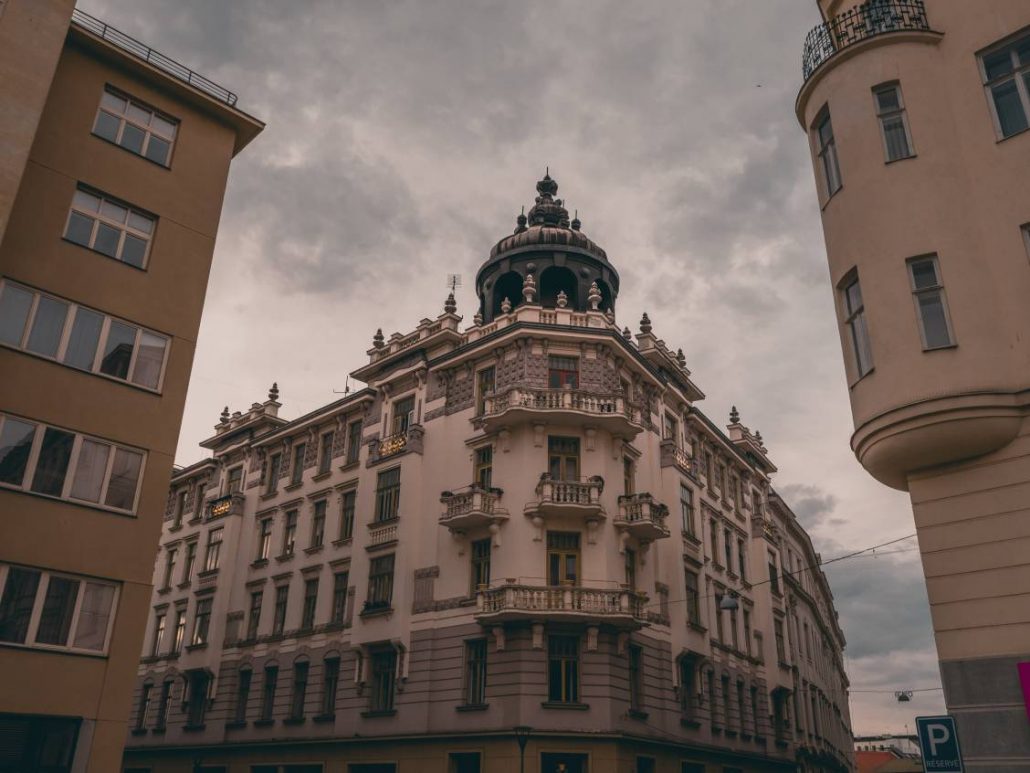 Phorto of a white domed building corner in the city of Brno, Czech Republic