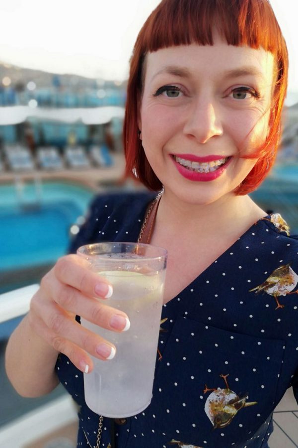 Drinking a drink on the deck of Sky Princess that I ordered with my Ocean Medallion