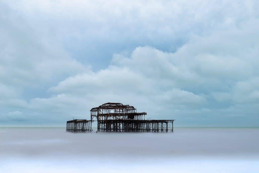 The remaining shell of Brighton West Pier standing in the sea