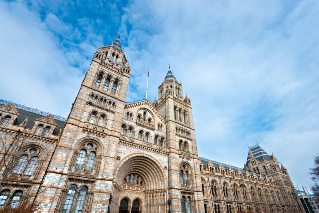 Facade of Natural History Museum with clear blue skies