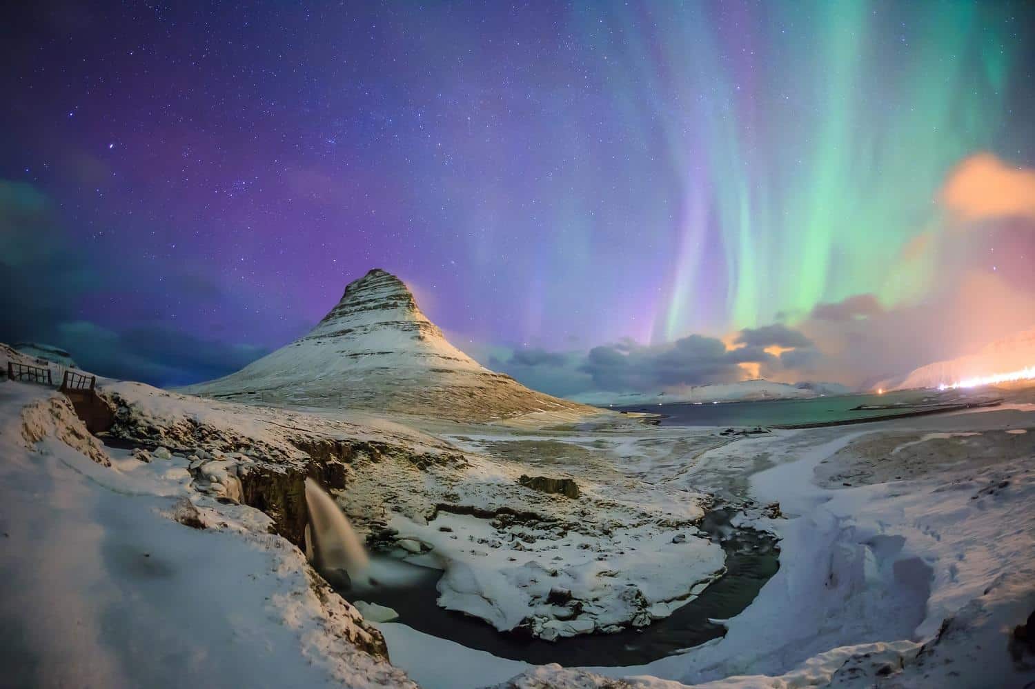 The Northern Lights over Mount Kirkjufell in Iceland